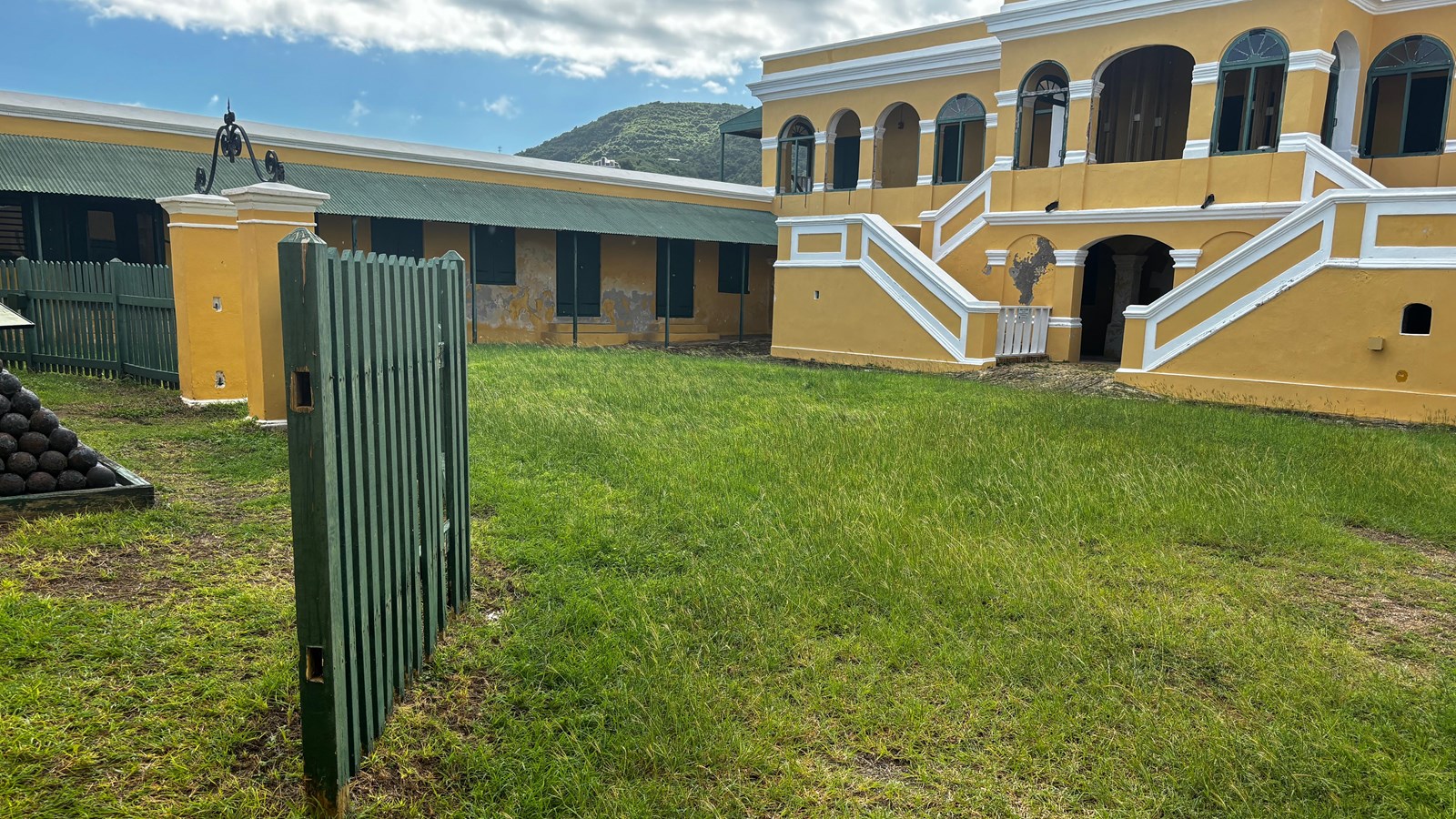 photo of a grassy lawn enclosed by walls.