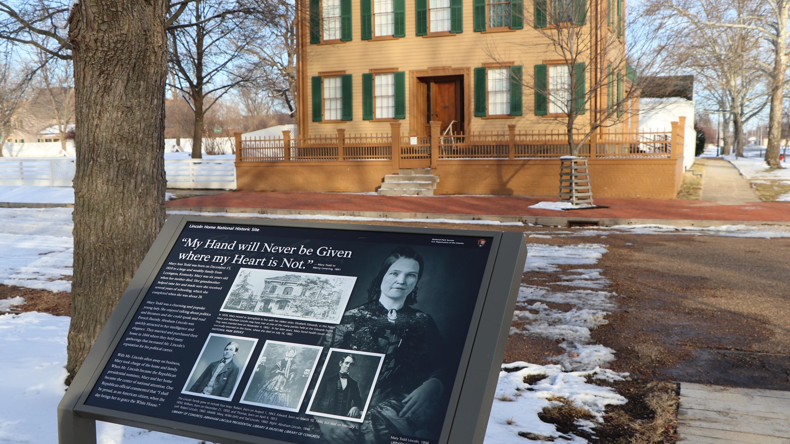 Outdoor wayside exhibit located across street from front face of Lincoln Home