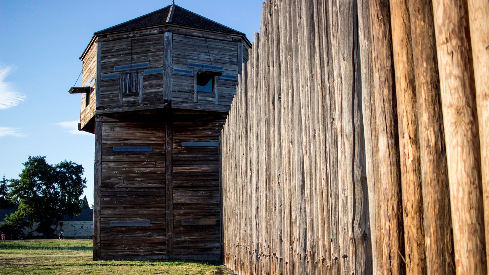 The wooden stockade wall and bastion.