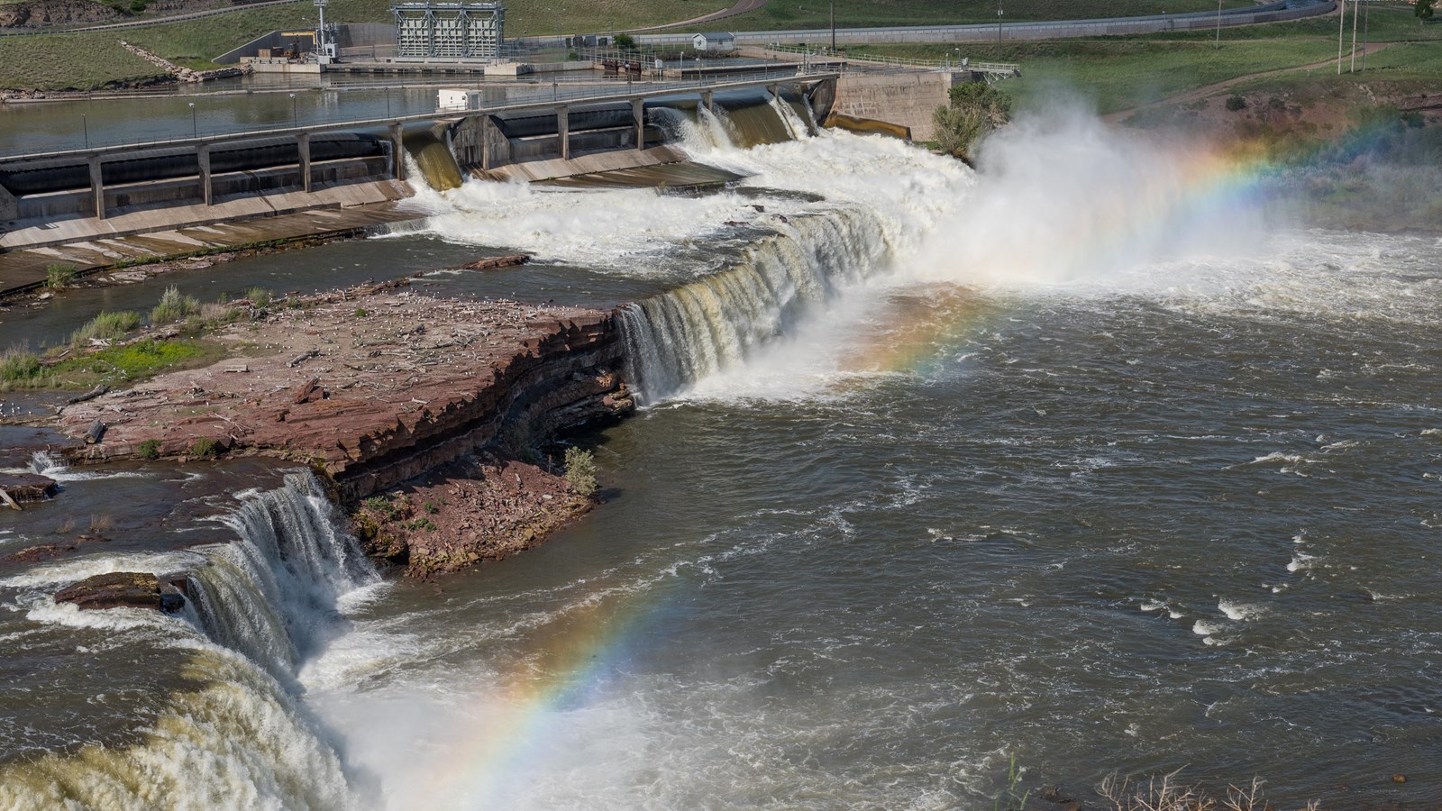 overlook at dam with rainbow 