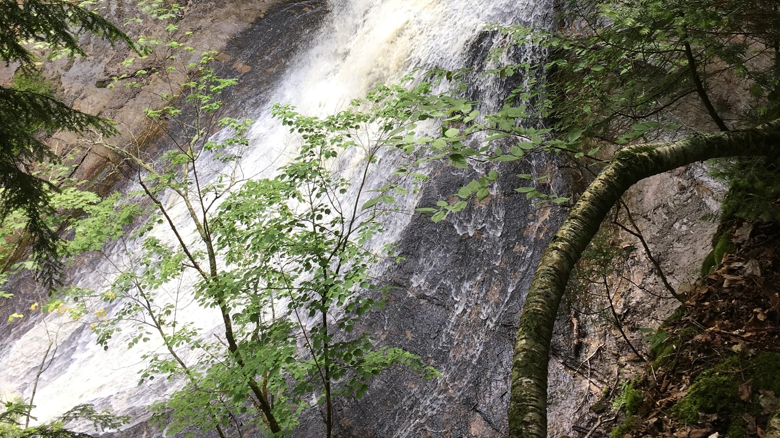 Chapel Falls cascades down the side of the rock face from right to left in the photo.