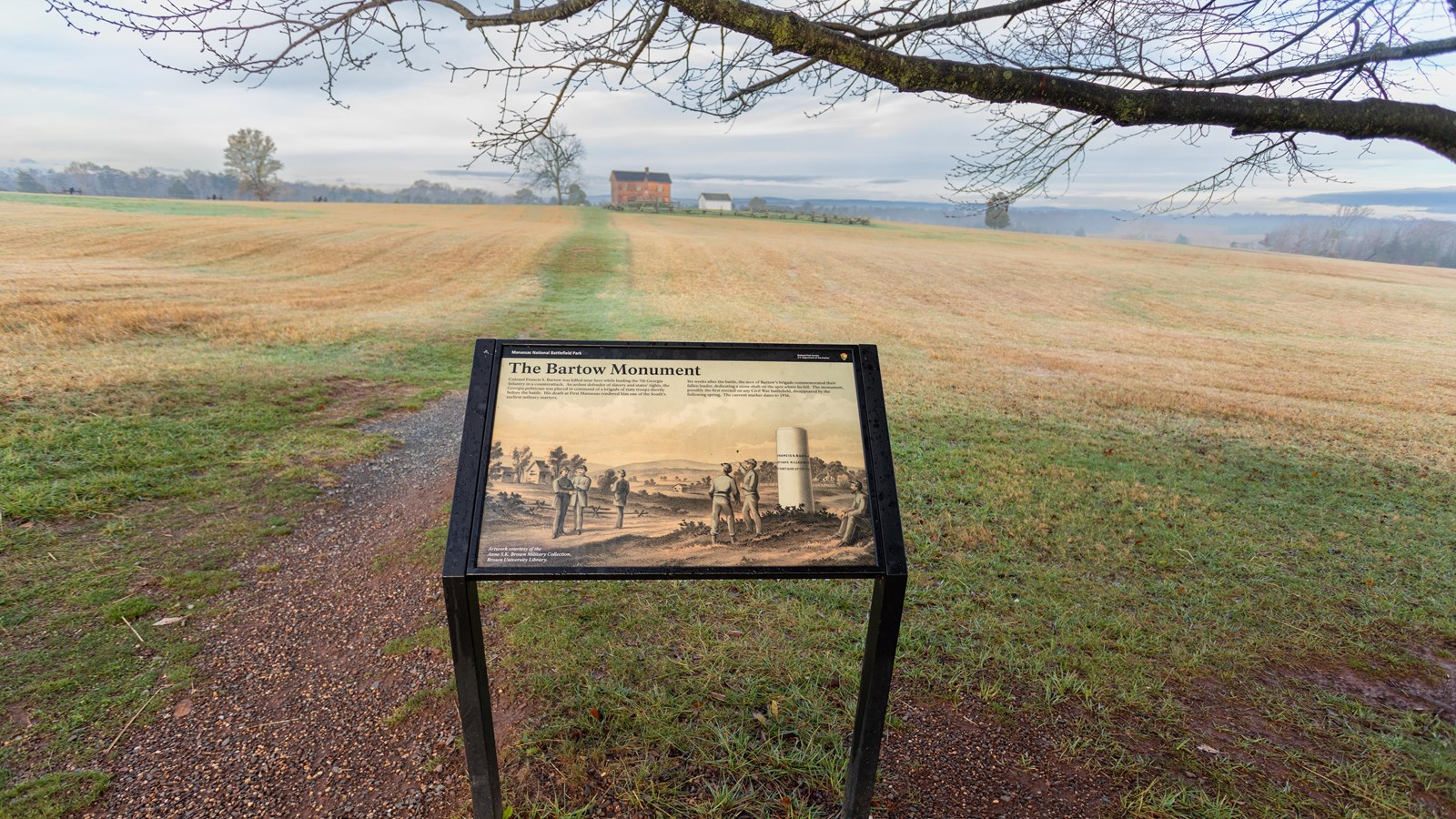 An informational panel in front of a house