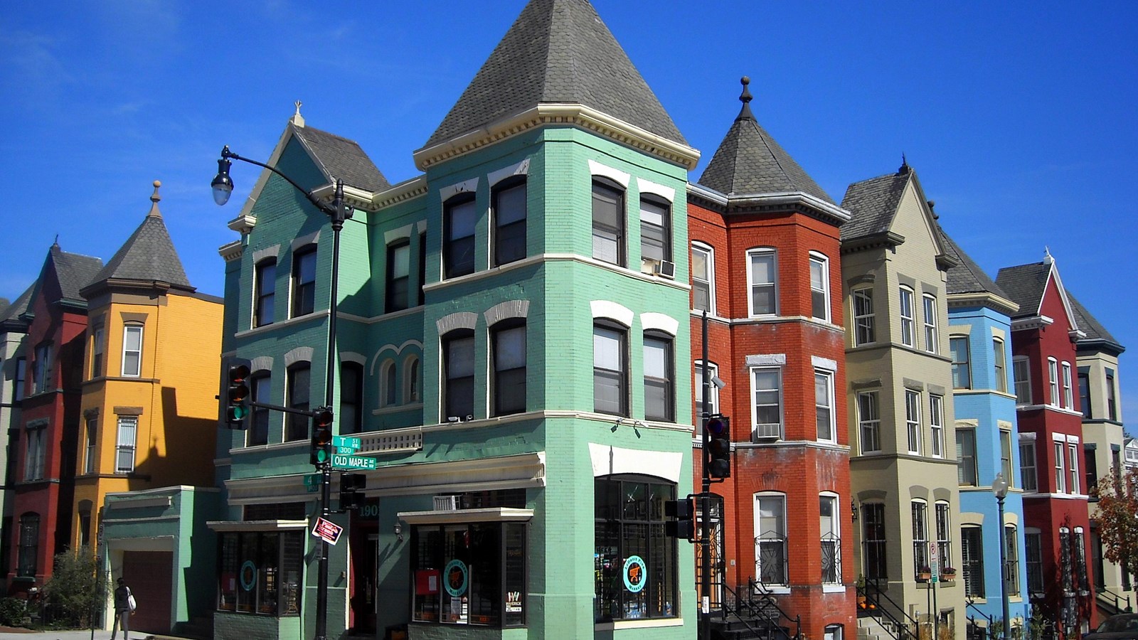 Photo of colorfully painted row houses. 