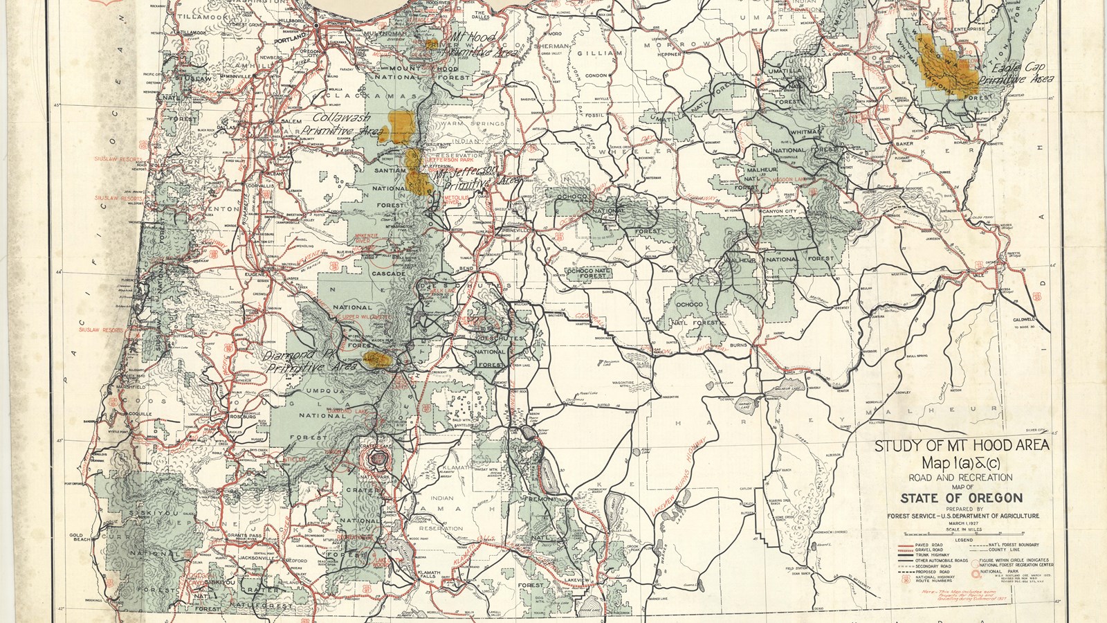 Map with red lines showing roads, green shading showing park area