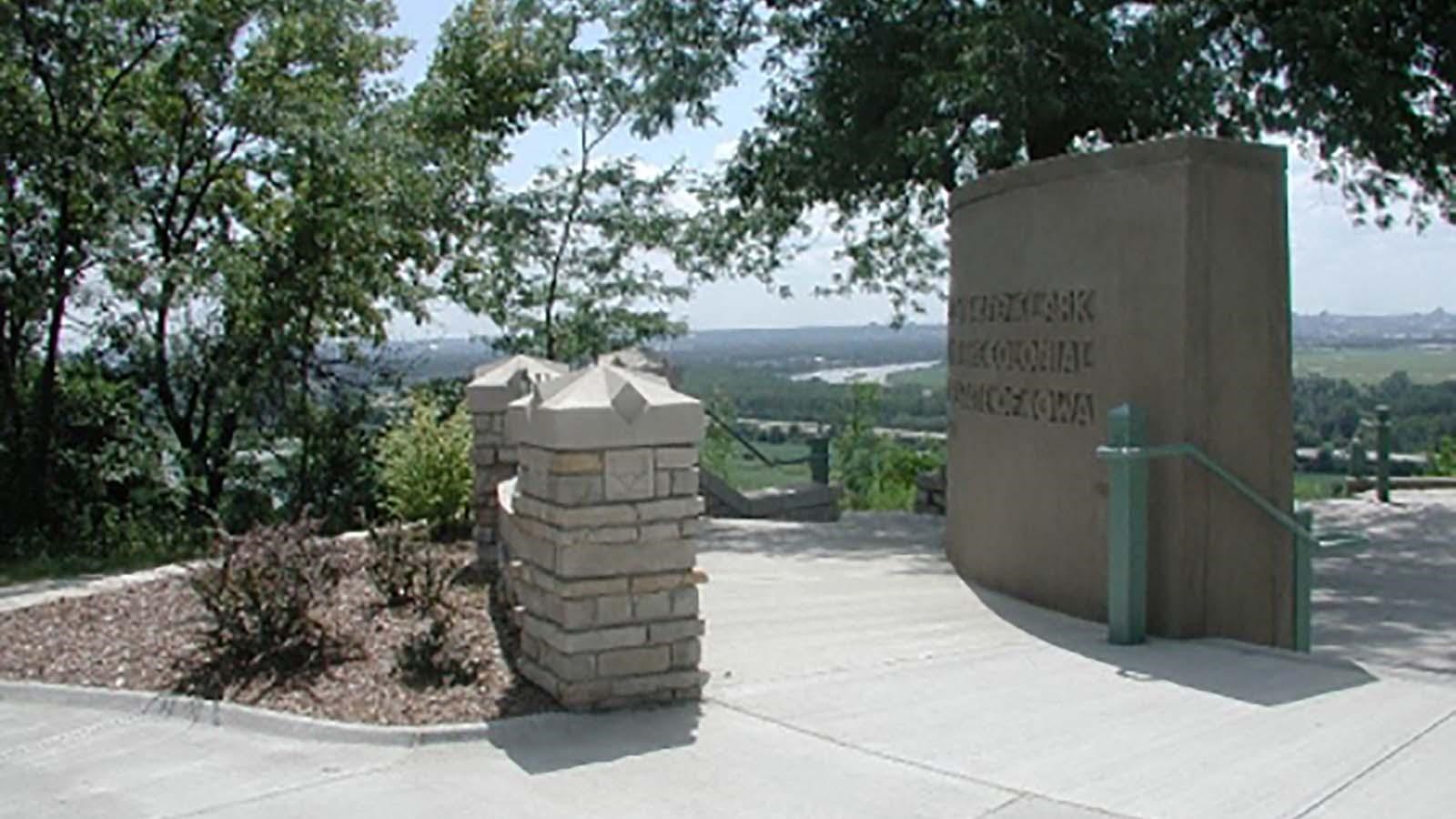 :  One of the stone monuments stands in a paved area