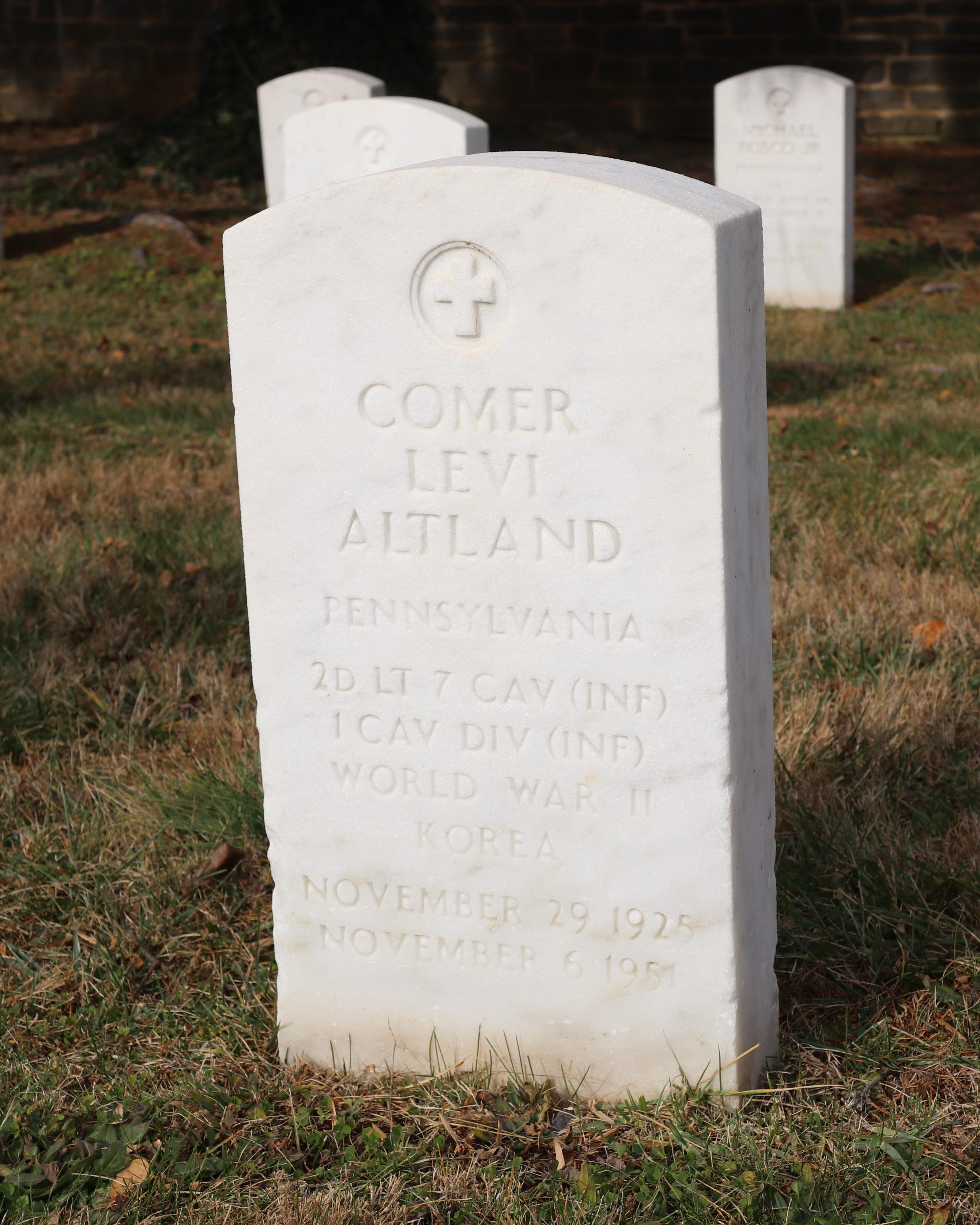 A white marble headstone for 2nd Lt. Comer Levi Altland