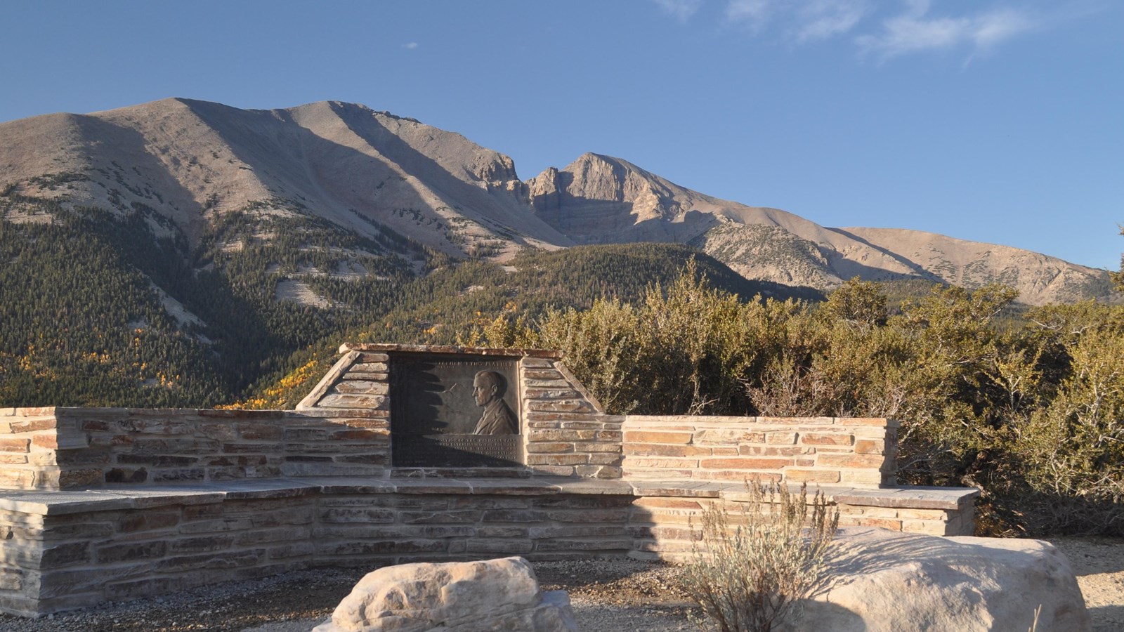 Steven Mather plaque at great Basin National Park with wheeler peak in the background.