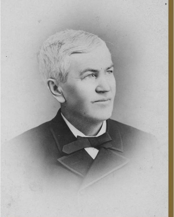 A portrait of a man with white hair from the 1880s.