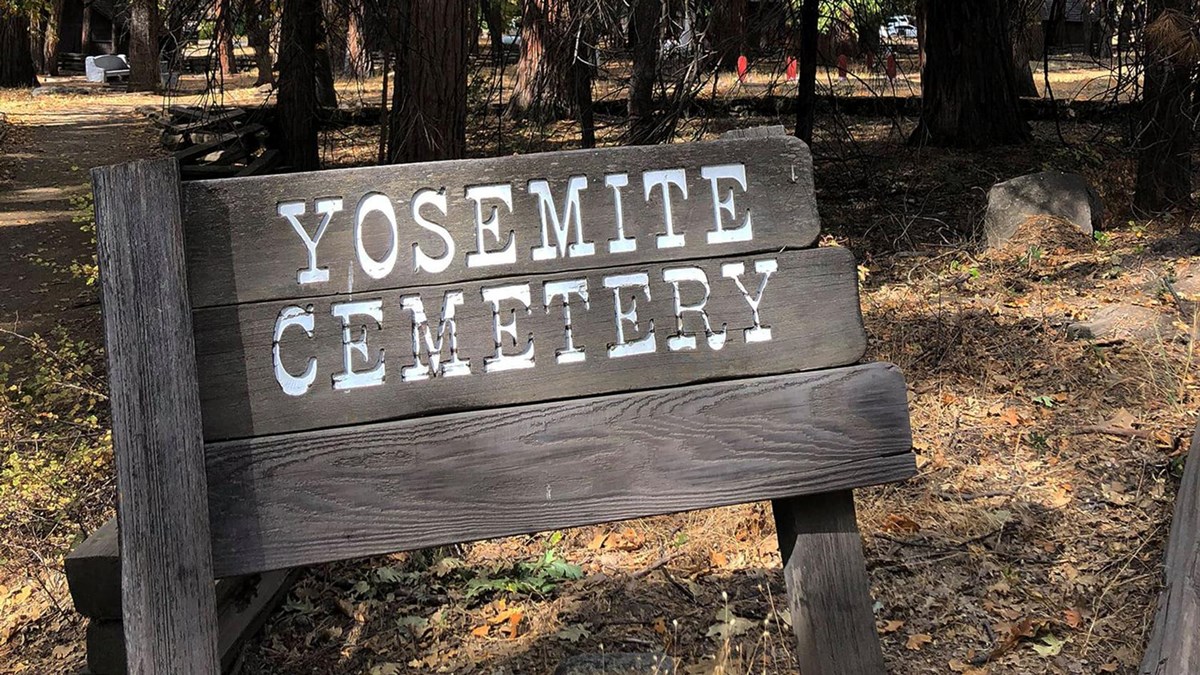 Wooden sign at entrance to Yosemite Cemetery