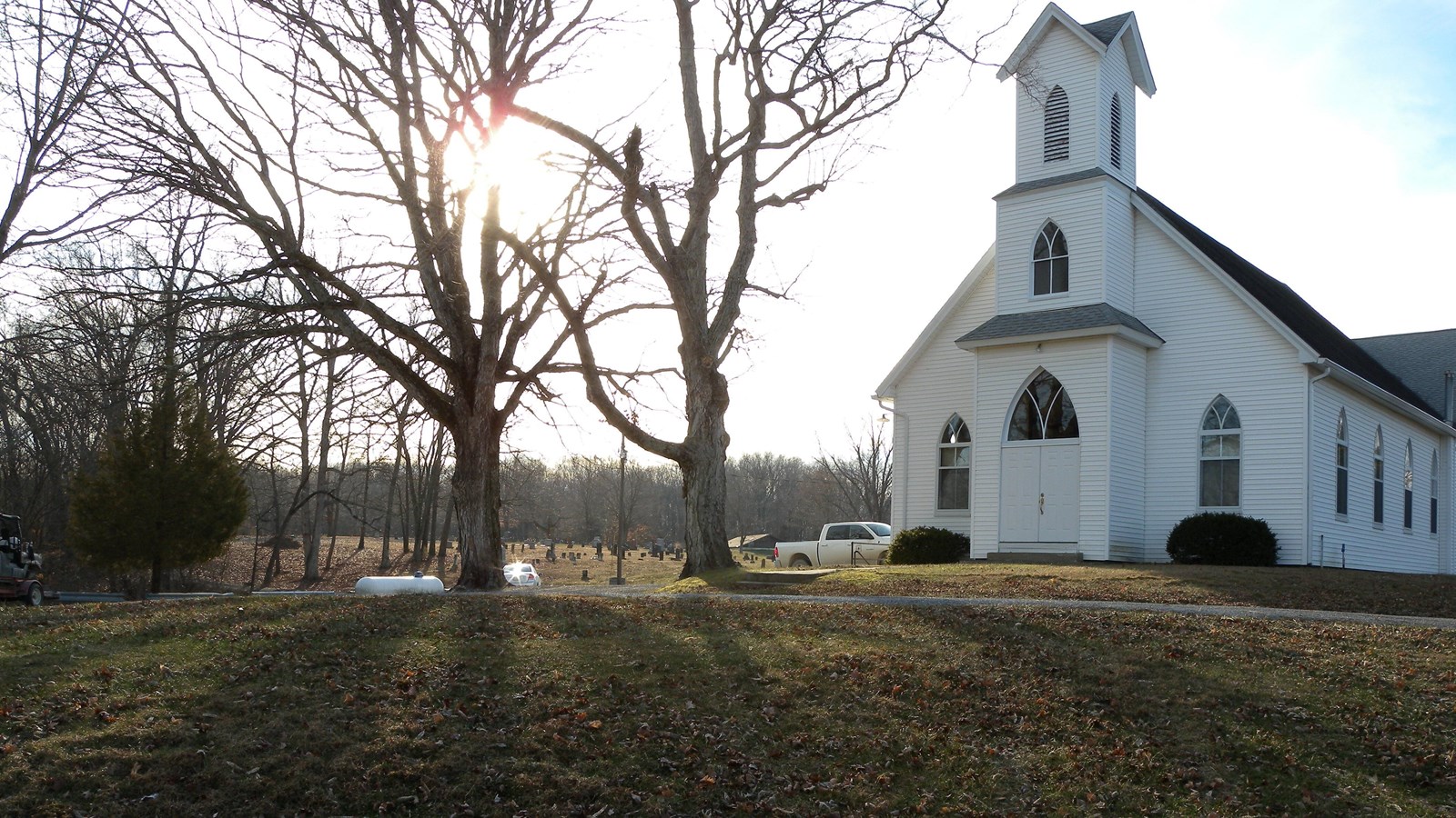 A white church with a steeple.