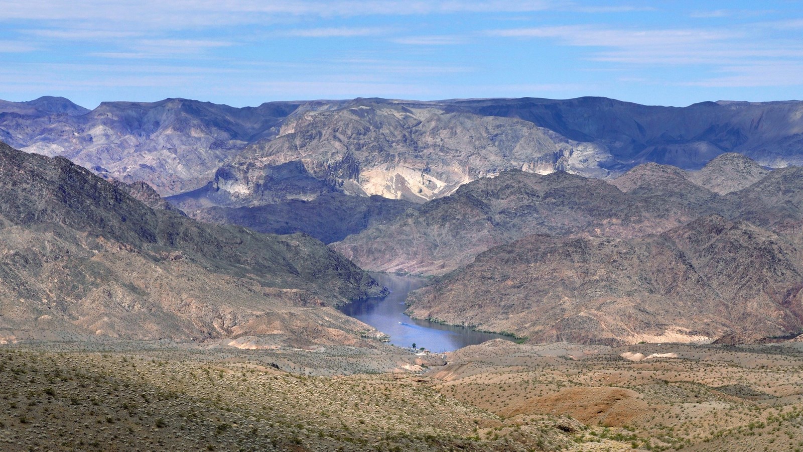Desert Canyon with river running through it.