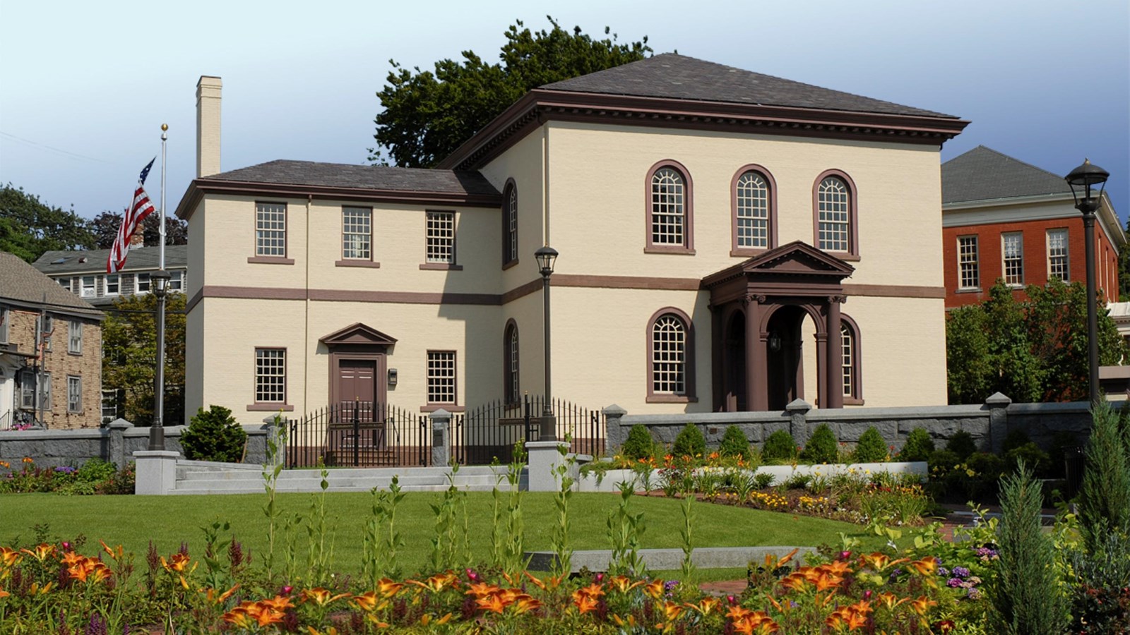 An ecru-colored two story building.