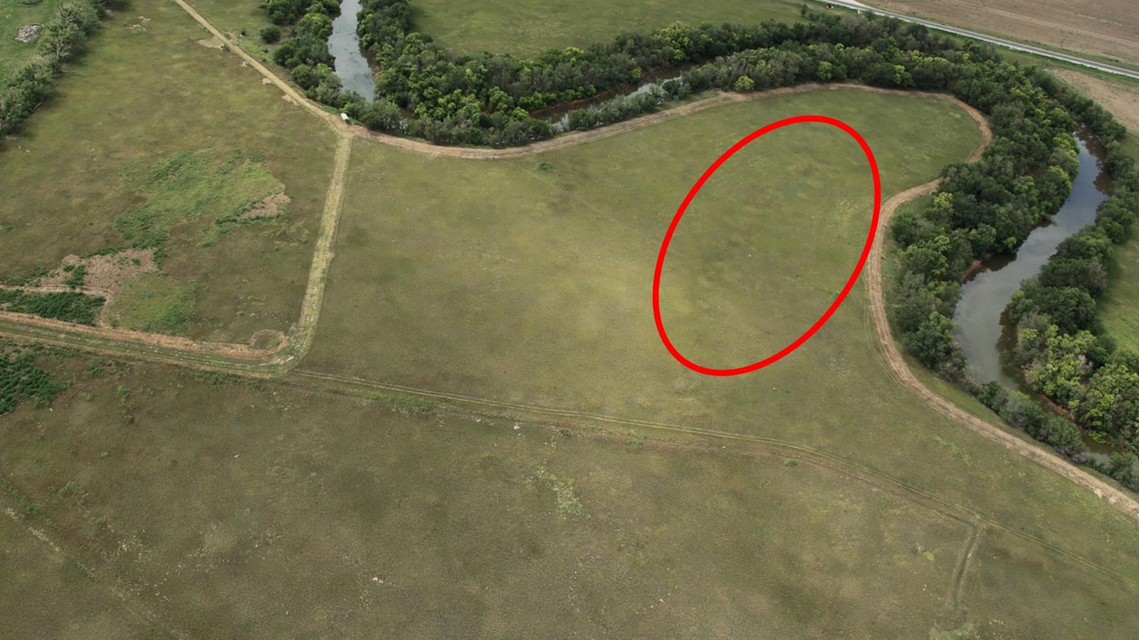 Aerial view of the History & Nature trail with beef corral location circled in red.