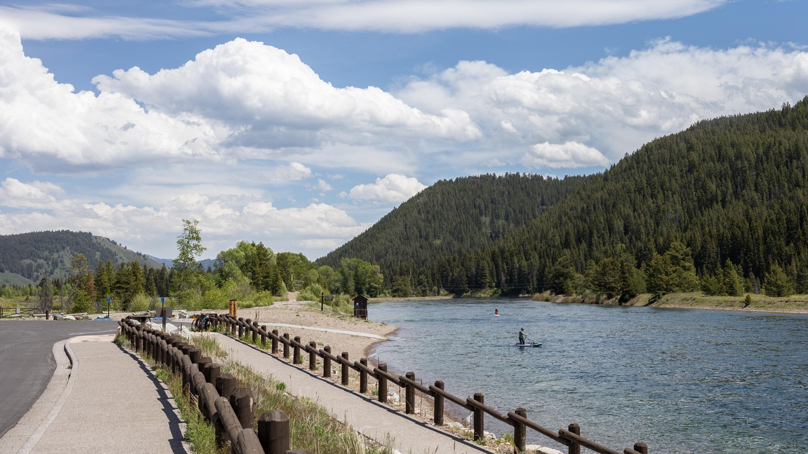 Paddleboards launch into the Snake River from boat ramp.