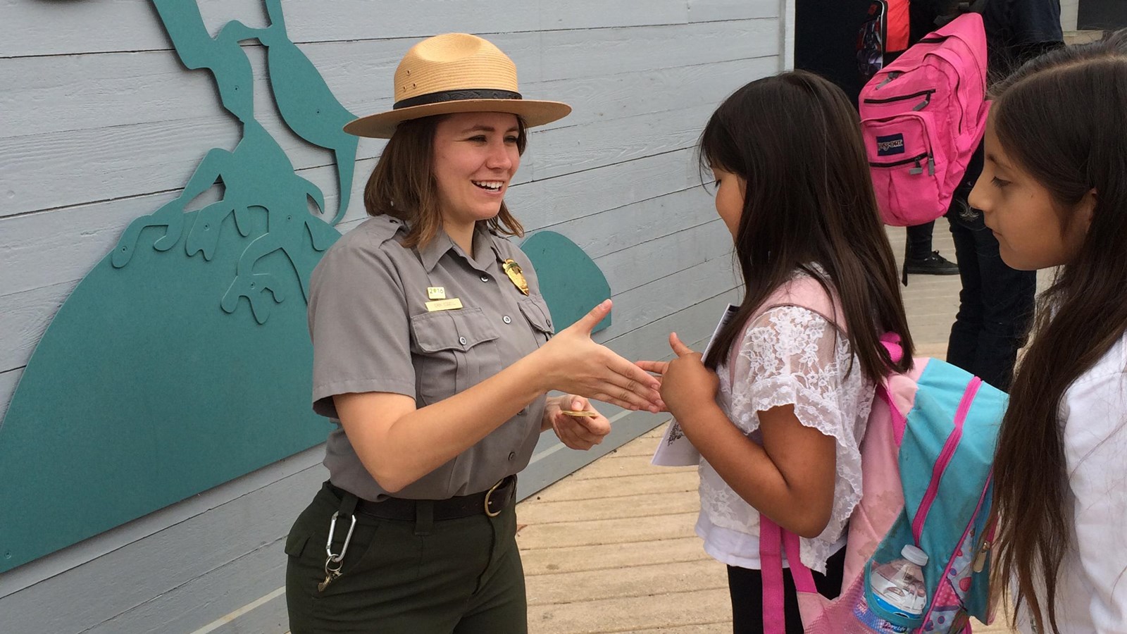 ranger talking with child