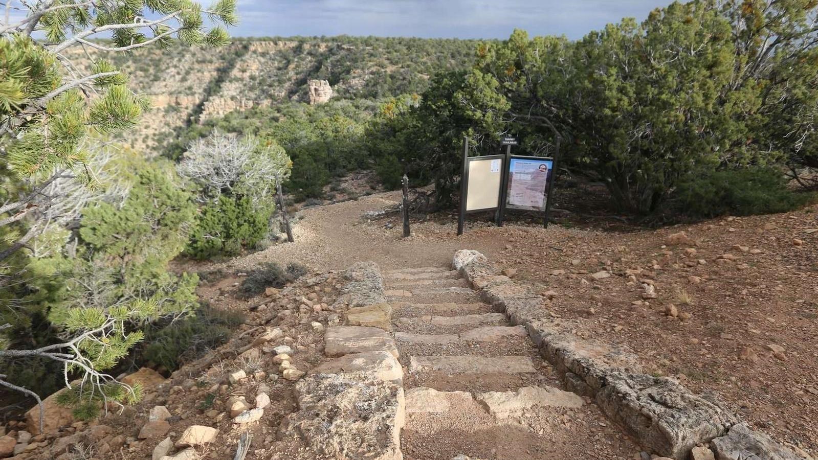 Steep steps lead to the trailhead sign at the Tanner Trailhead.