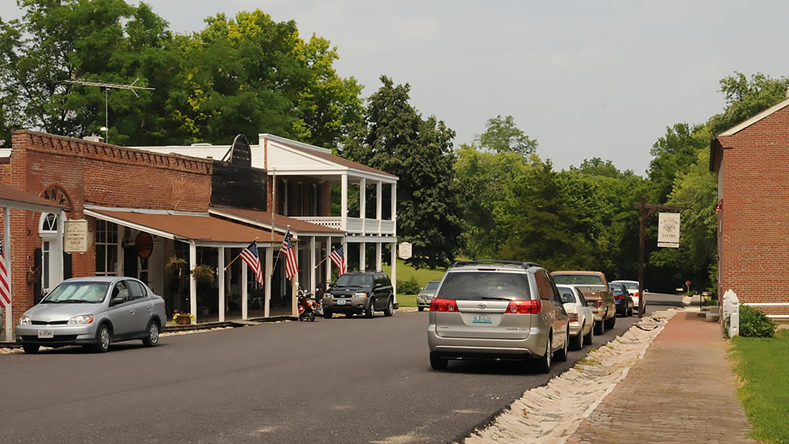 Roadway with two-story storefronts on either side