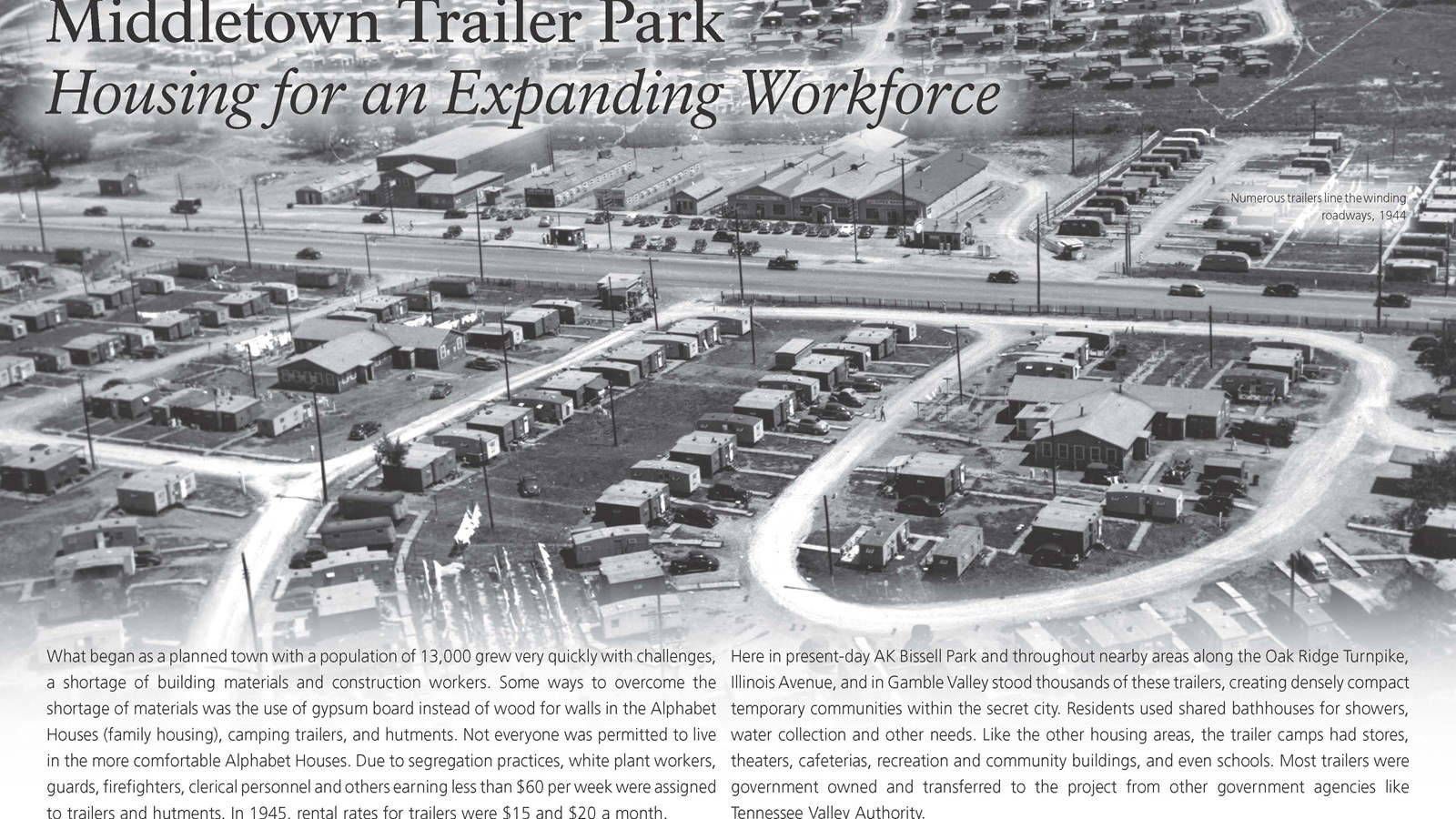 A wayside with text and an aerial photo of a large trailer park.