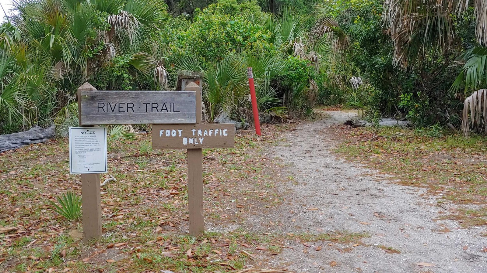 A wooden sign with text
