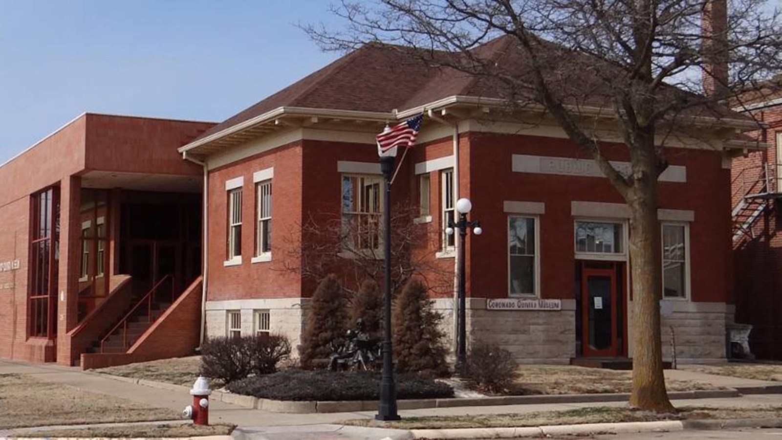A two-story red brick building