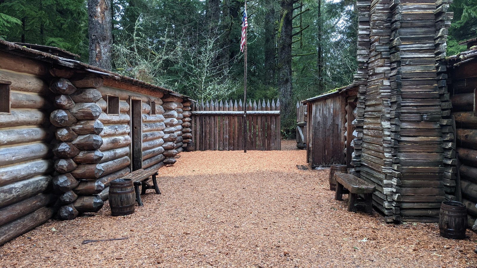 A 48 foot long by 20 foot wide open space in the middle of Fort Clatsop with a flagpole.