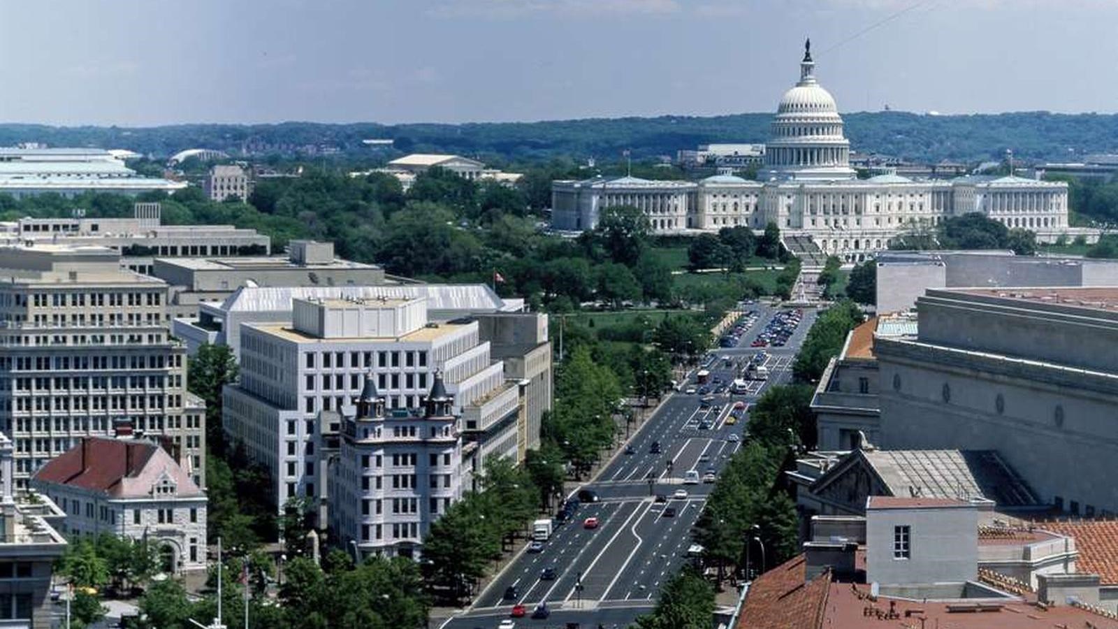 Wide road and traffic leading to Capital.