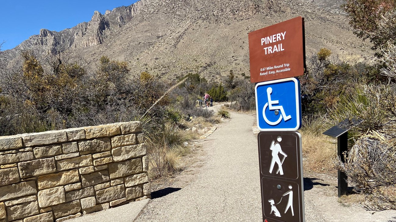 A signpost contains information about a trail