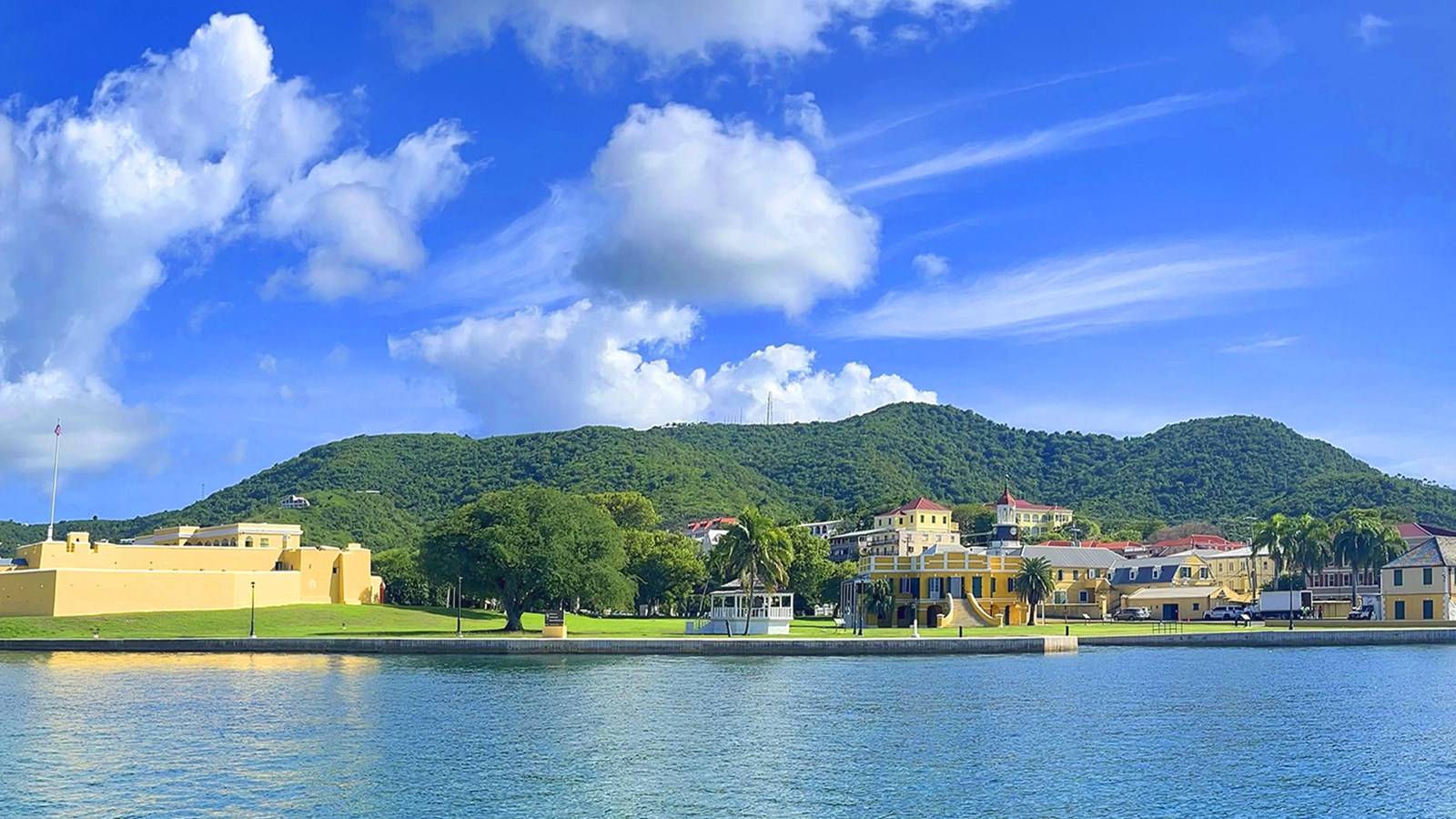 Christiansted waterfront with Fort Christiansværn and historic Danish buildings.