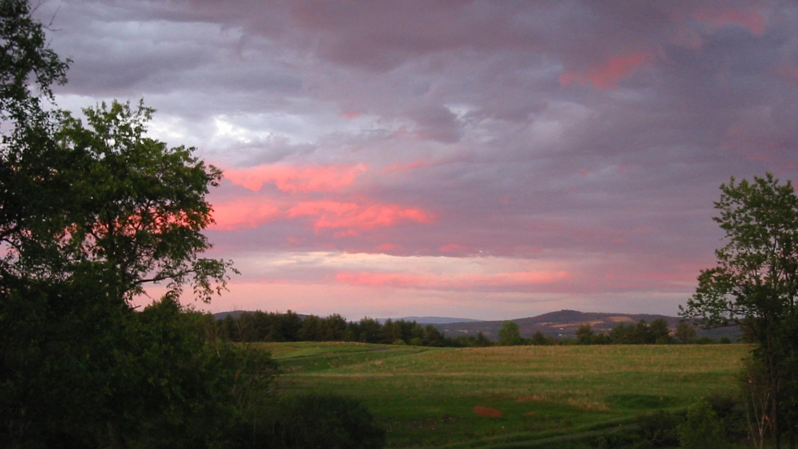 Red sky of sunset overlooking Chatfield Farm