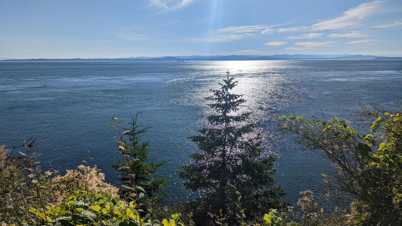 Color photograph of a striking oceanside view of a body of water seen from on high