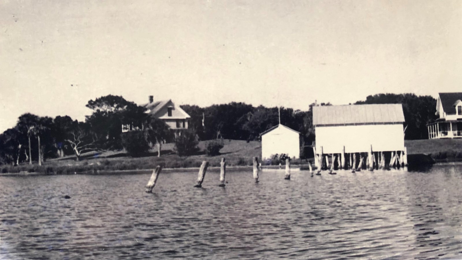 Seminole Rest with boat house and pilings from 1920\'s.