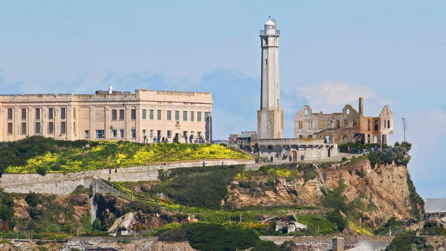 Alcatraz Island profile showing lighthouse towering over the Warden\'s House.