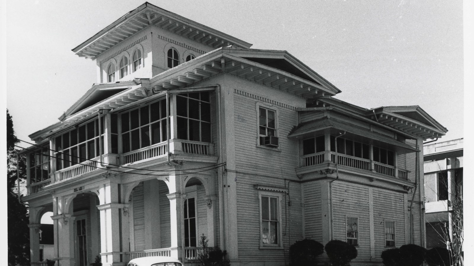 Mansion with ornate porch and windows