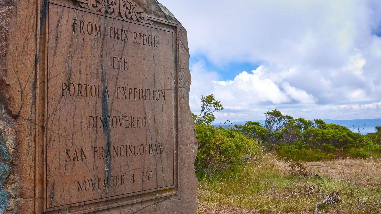 Carved stone monument commemorating the Portolá expedition\'s discovery of San Francisco Bay.