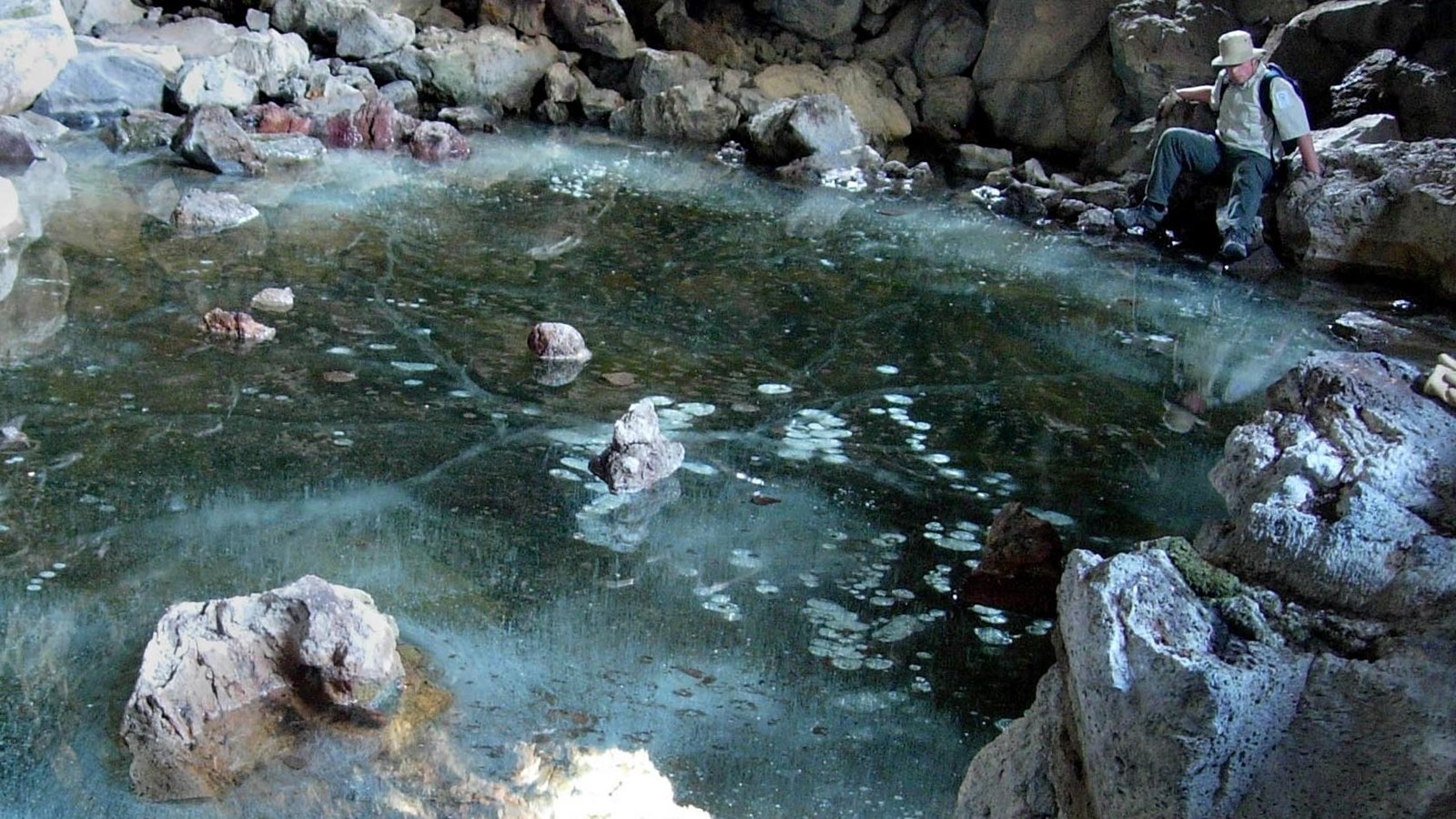 Heppe Cave\'s ice pool when frozen.