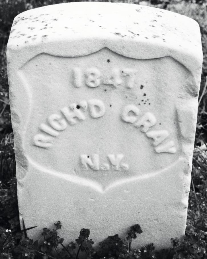 White marble headstone of Richard Gray.