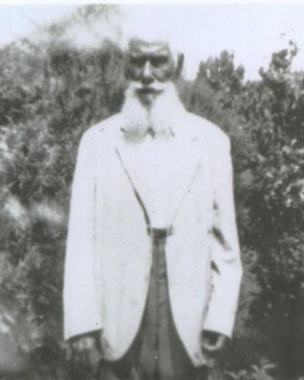 Black and white image of African American homesteader Benjamin Franklin Fields, Sr. in light suit.