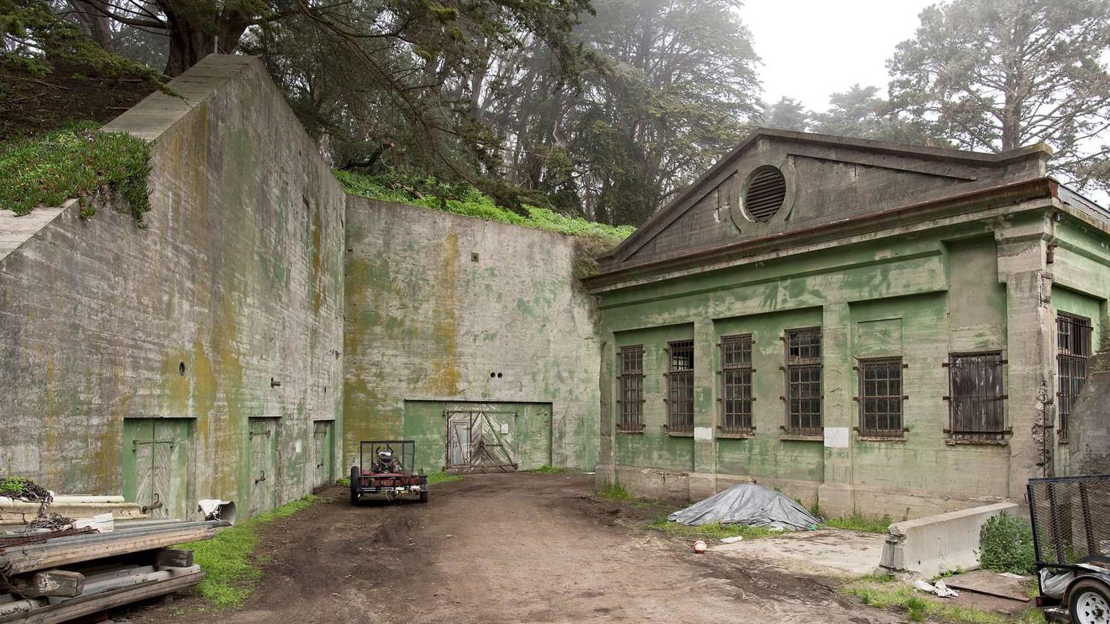 Concrete walls and air compressor building of Battery Dynamite.