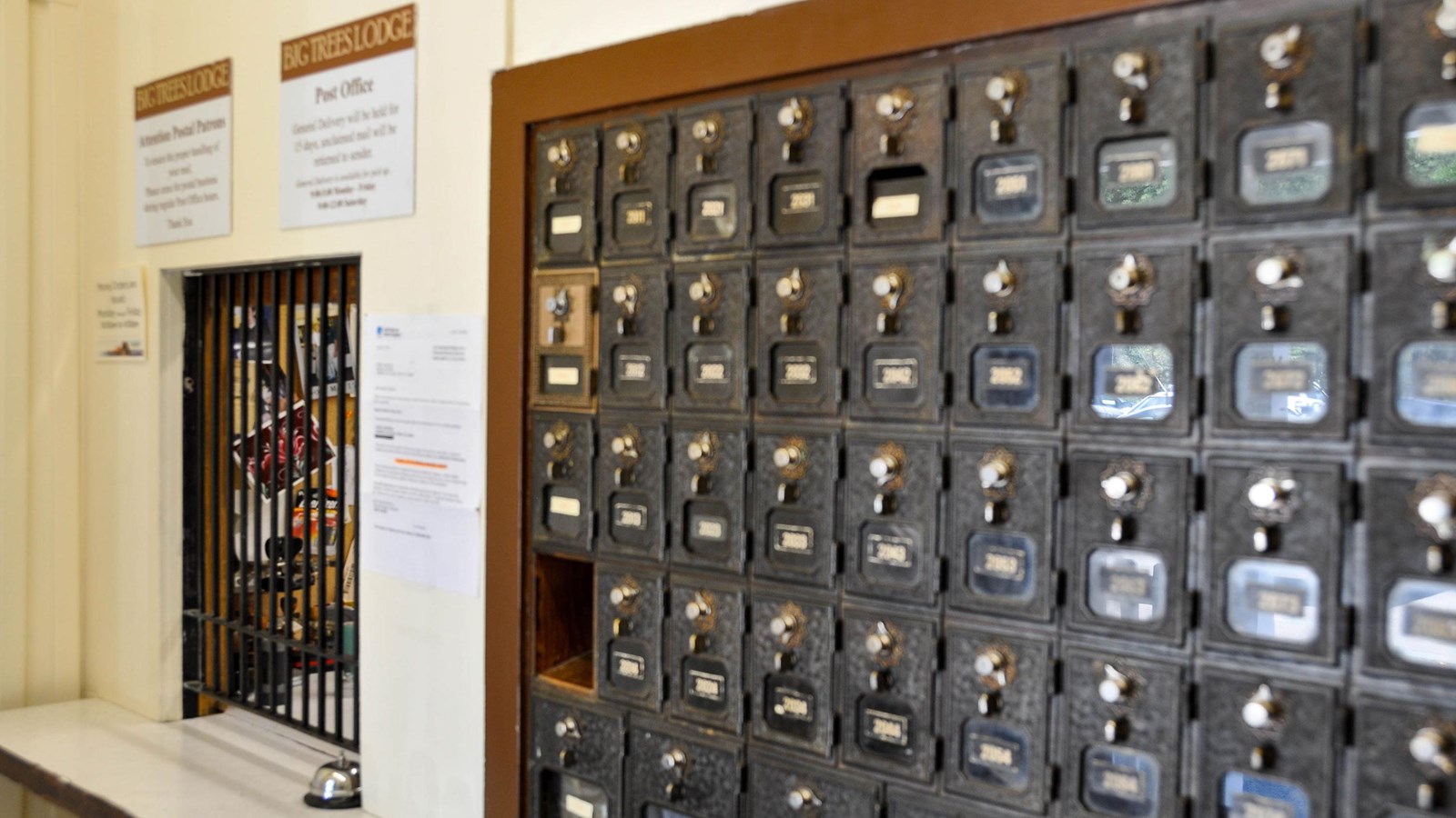 Wawona Post Office interior with small window and metal post office boxes