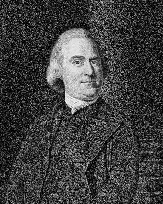 Sam Adams portrait with white wavy hair covering his ears, and a buttoned-up vest under a jacket