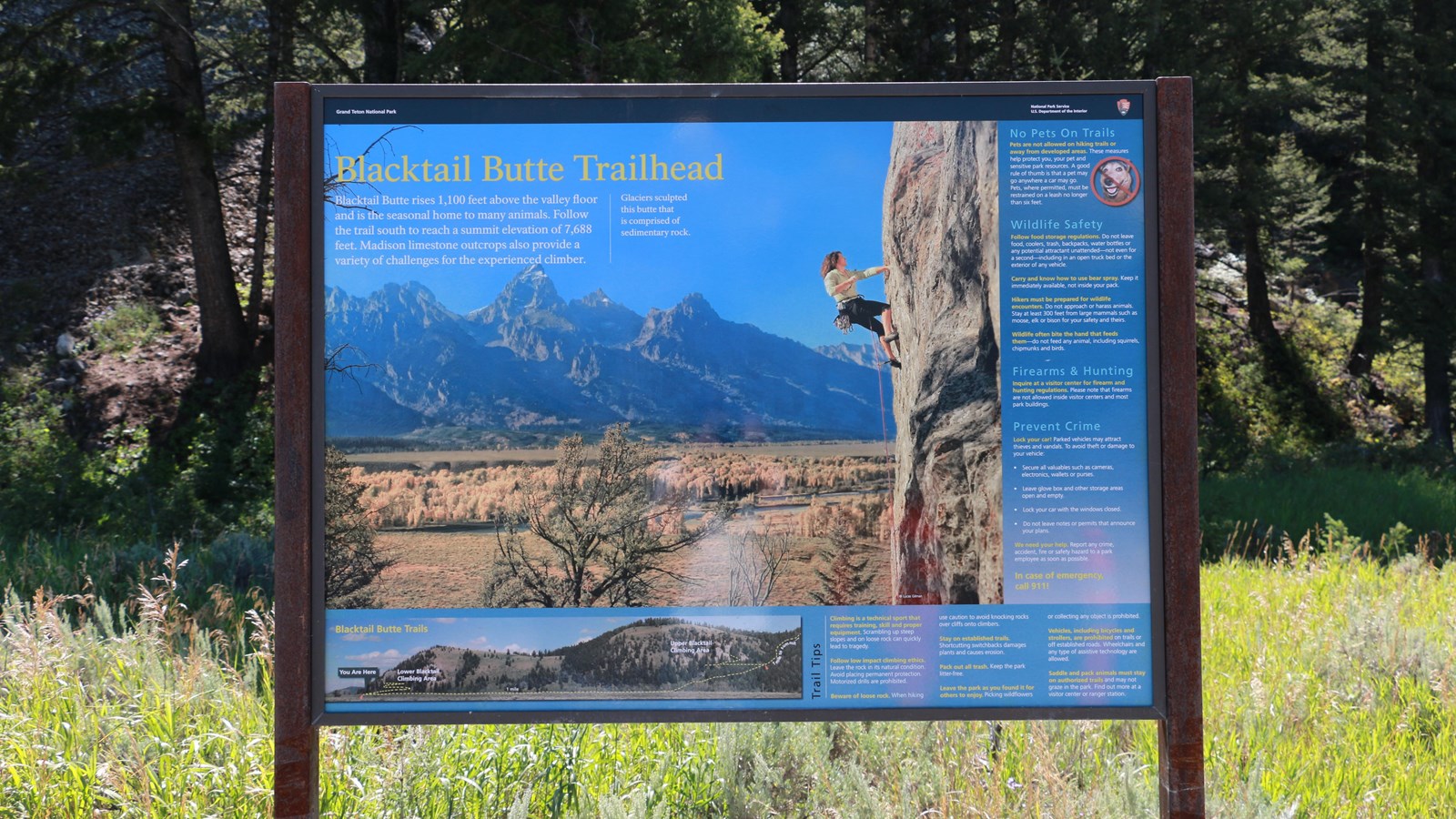 A trailhead sign titled, 