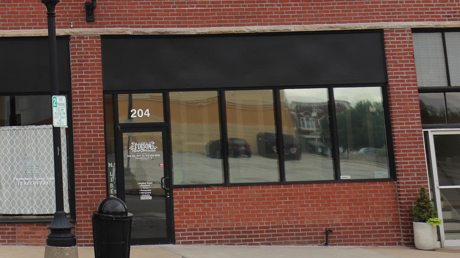 A two-story brick building with store front just off the historic Independence square.