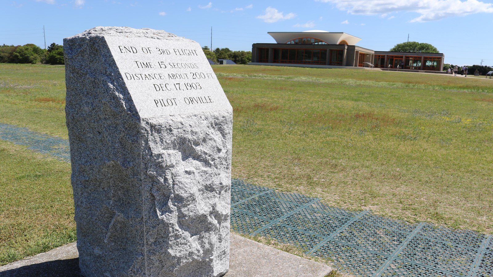 Granite marker, text: 