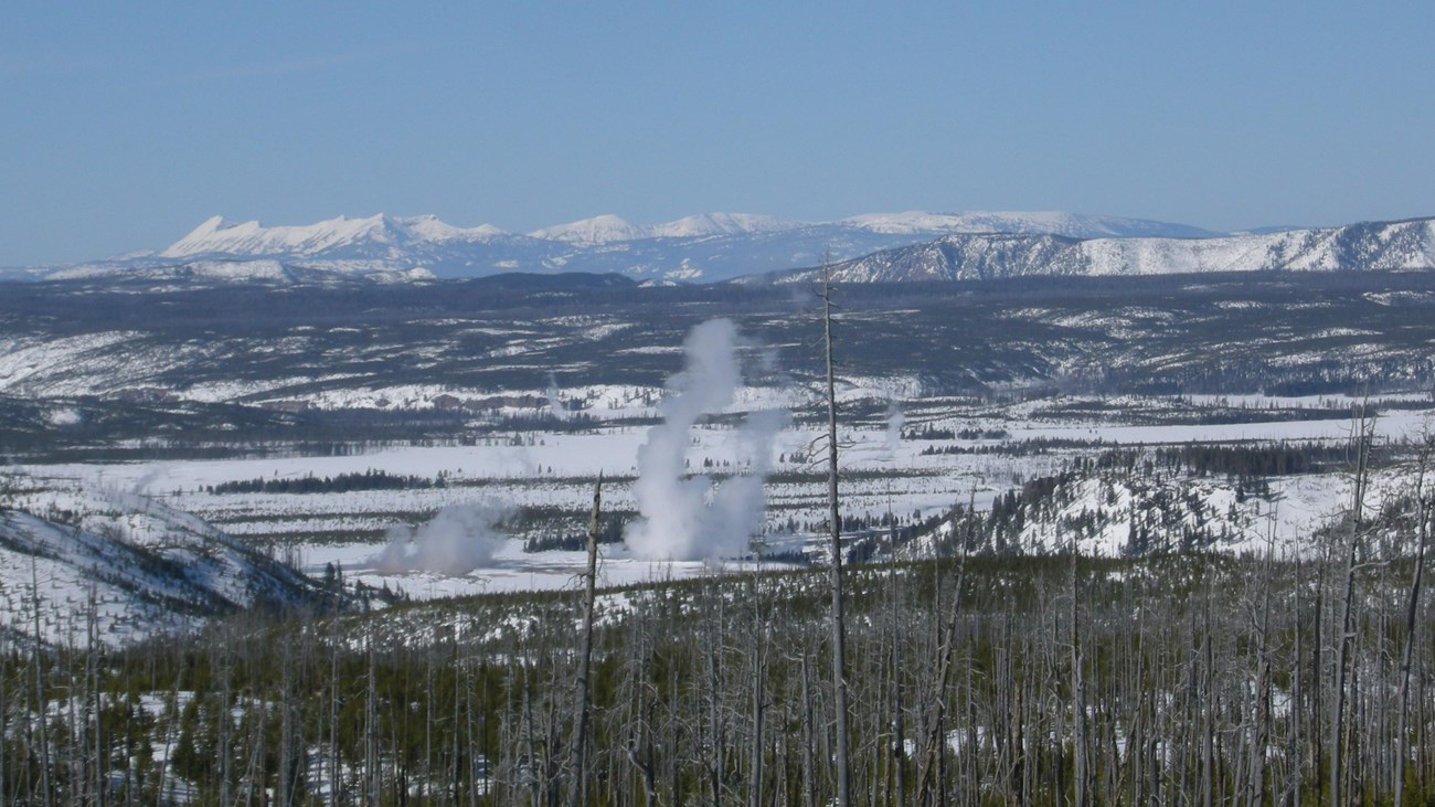 Views from the Mallard Creek Trail looking toward Midway Geyser Basin and the Madison Range.