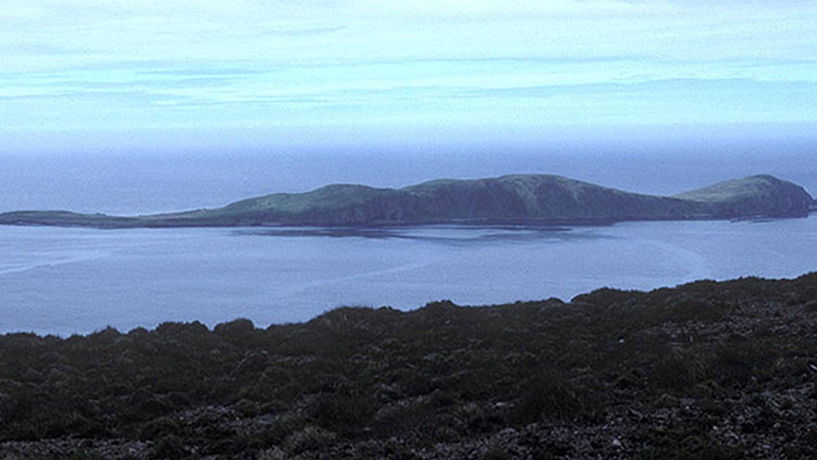 A long and narrow island on the ocean.