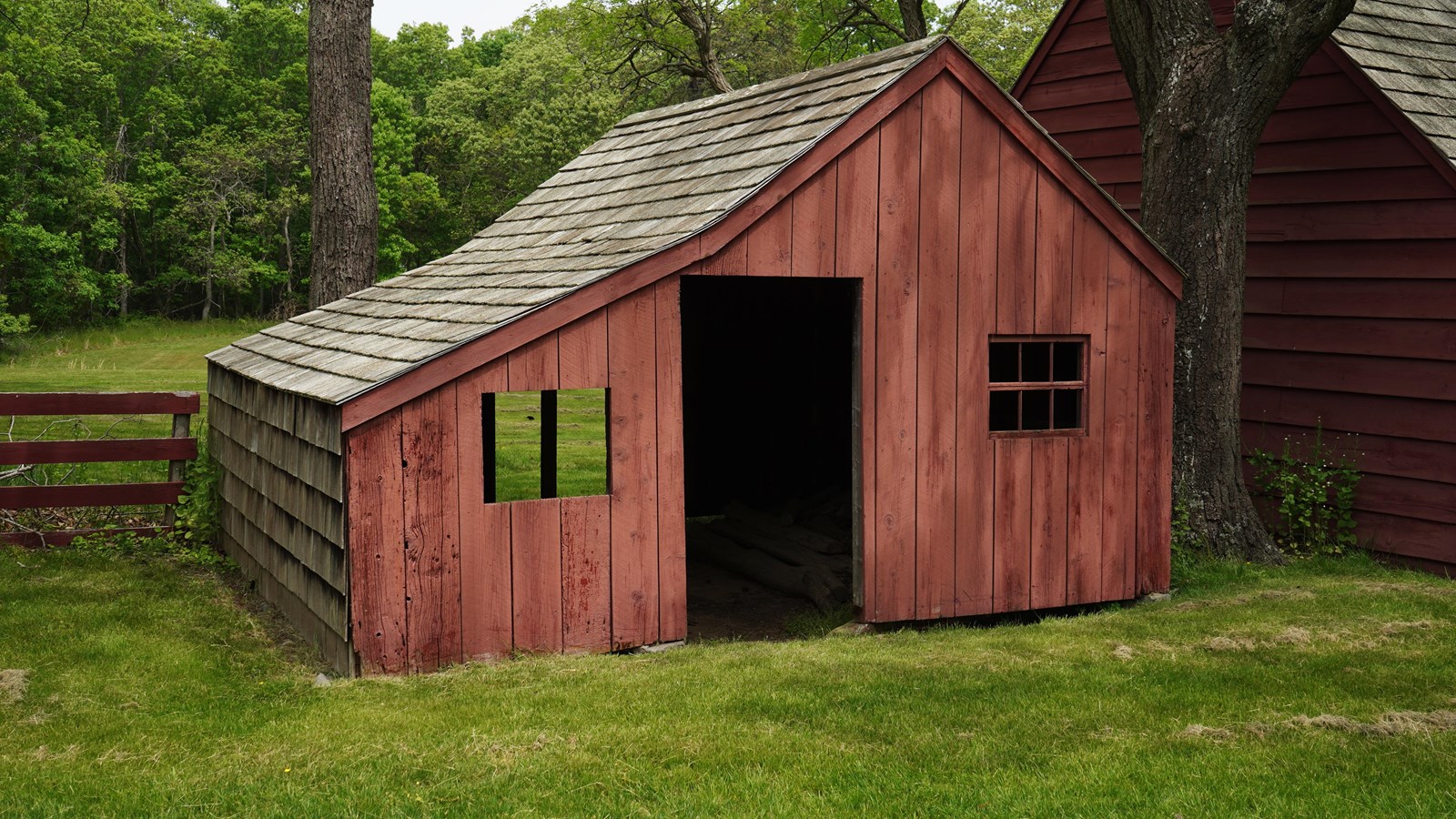 A small red open building 