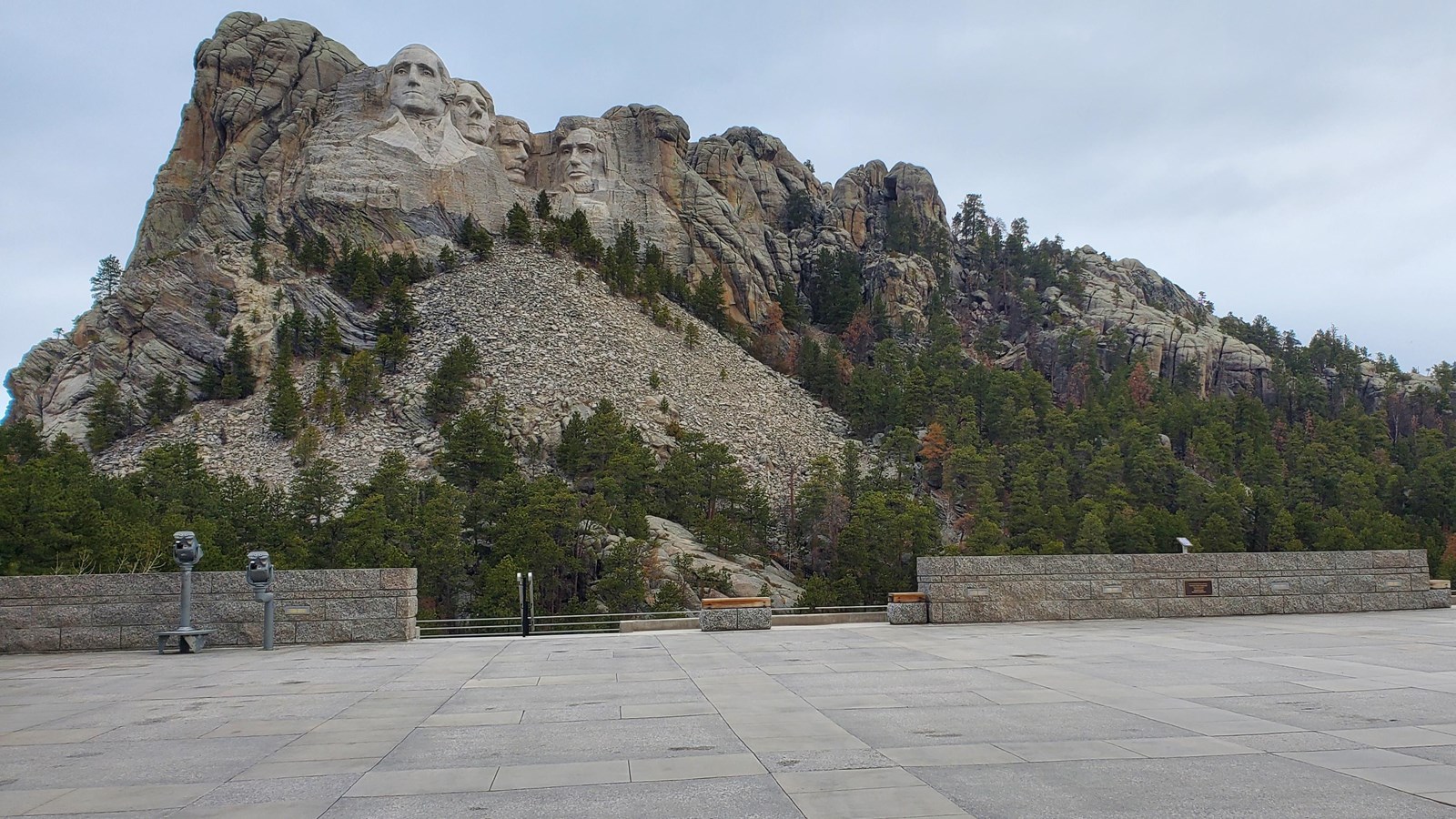 Photo of the concrete surface of the Grand View Terrace and Mount Rushmore.