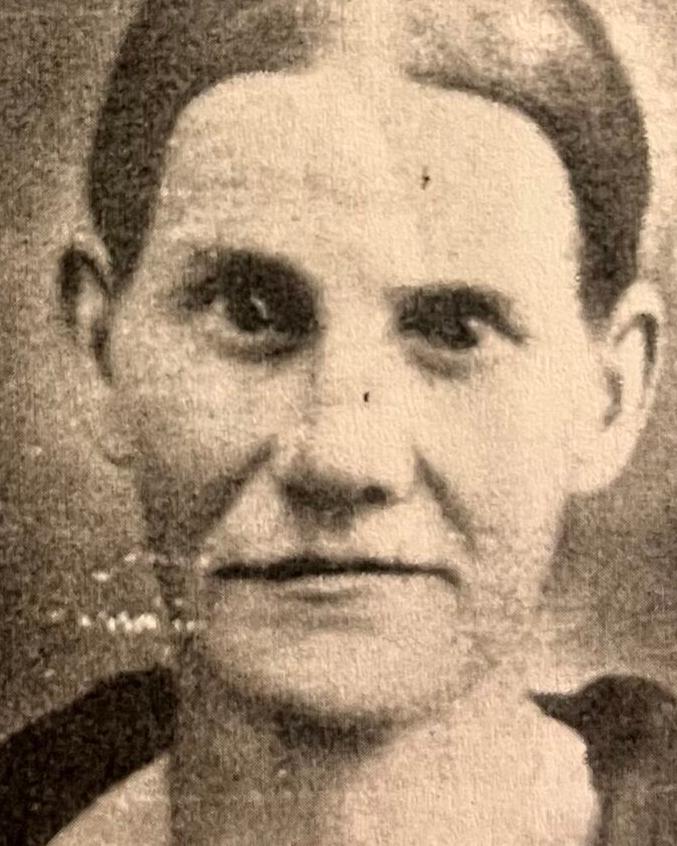 An 1800s portrait photograph shows a woman with parted hair and a dark coat. 