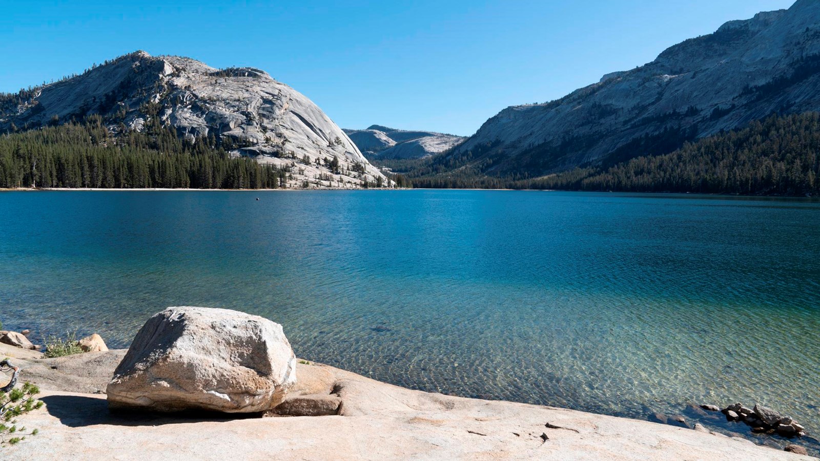 Lake with granite cliffs at its edge