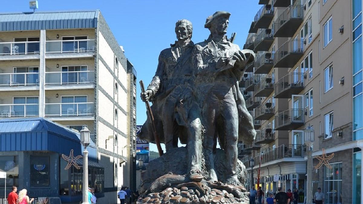 A bronze statue of Lewis and Clark sits in a roundabout at the promenade in Seaside